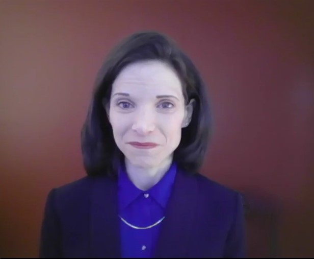 woman in blue sport jacket