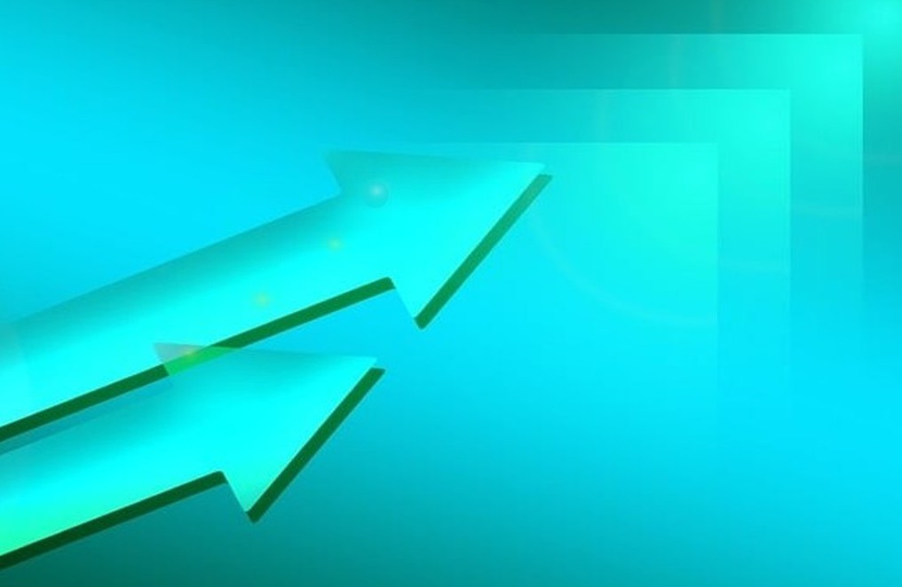green arrows pointing diagonally upward