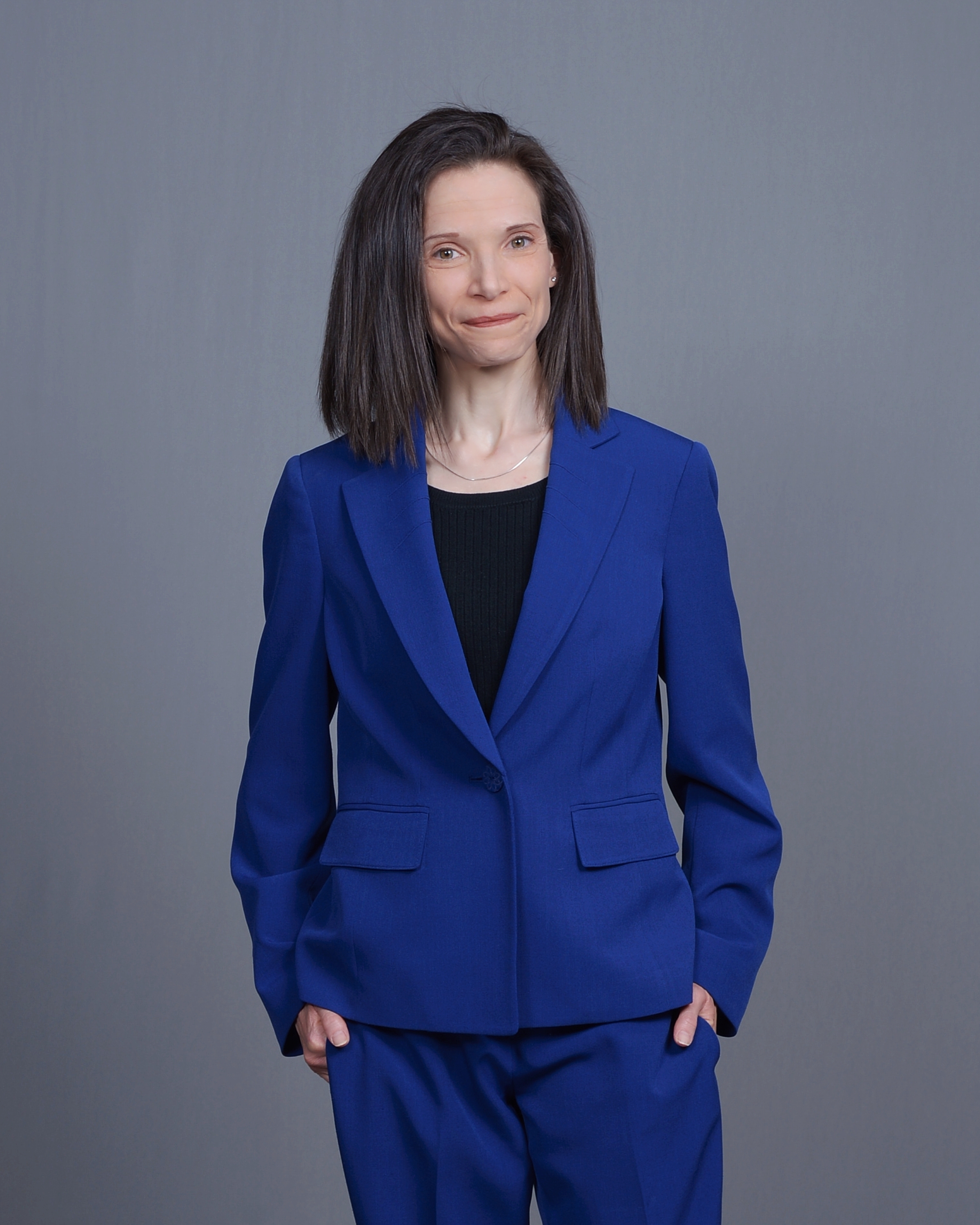 woman in blue sport jacket